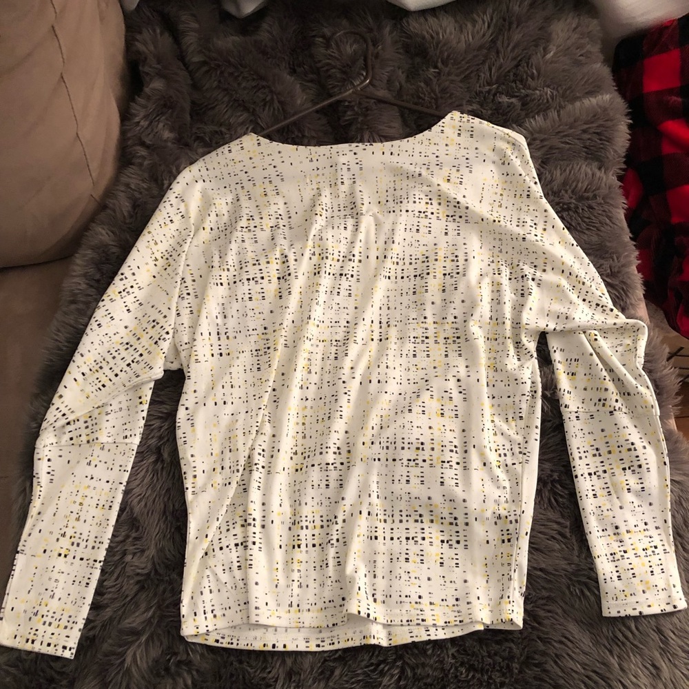 White, Black, and Yellow long sleeve top